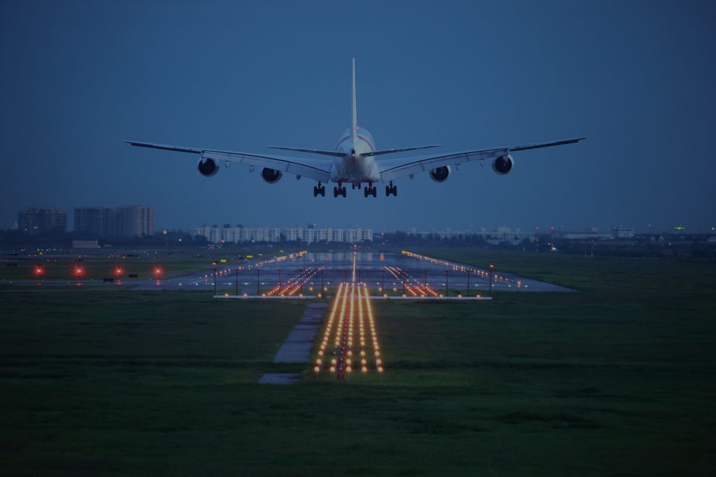 Aviation Plane Coming in for Landing. Flight Planning Services and Flight Planning Solutions